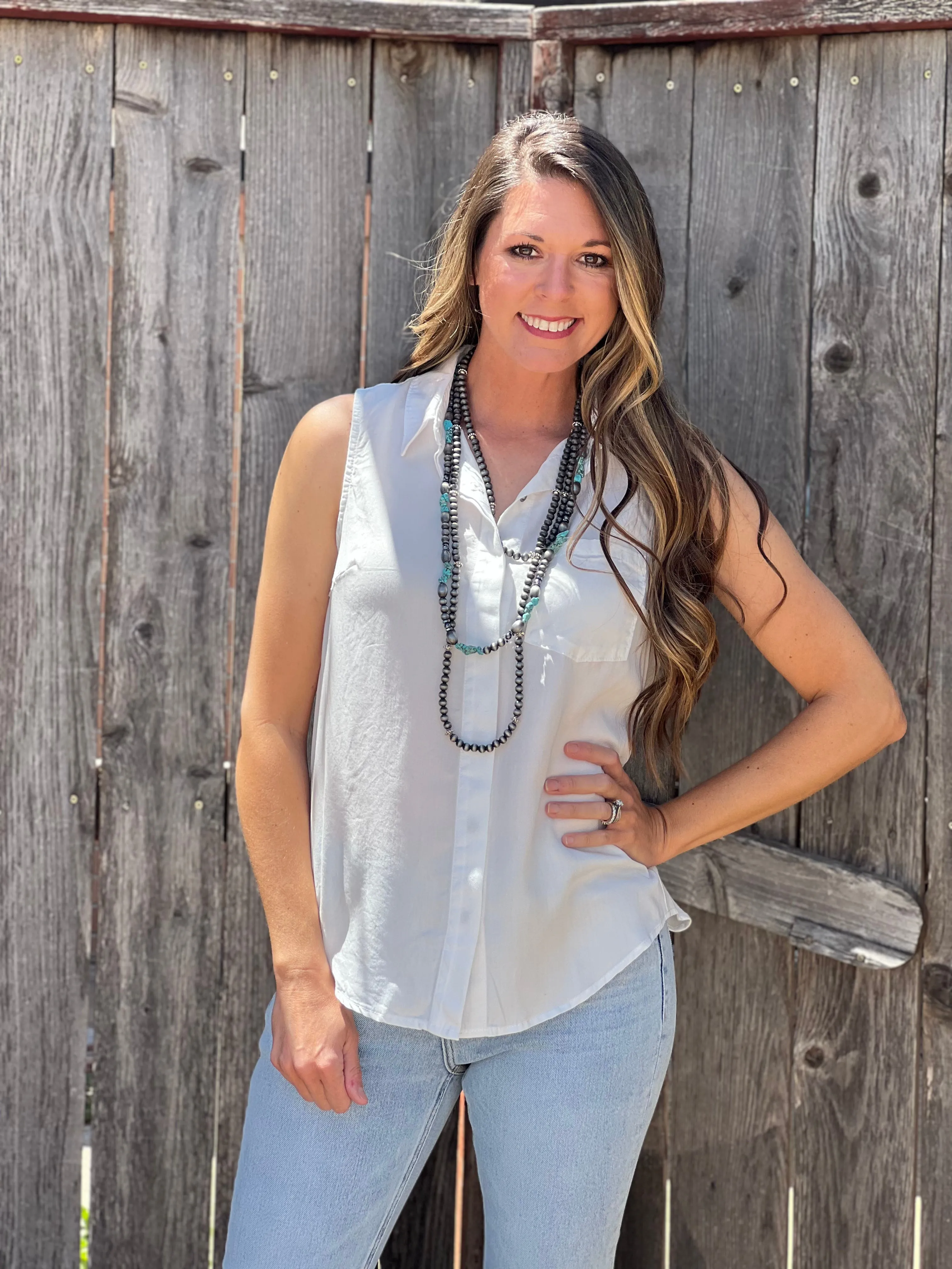 Daisy White Sleeveless Button Down Blouse