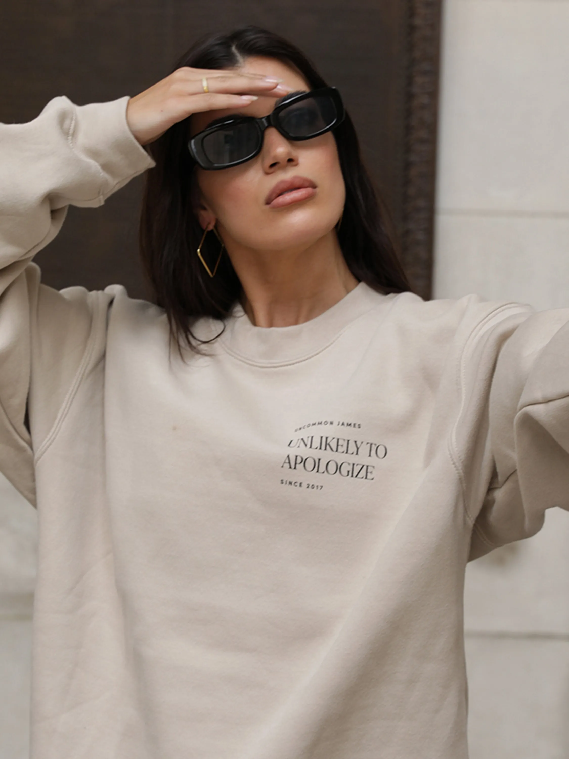 Unlikely to Apologize Sweatshirt